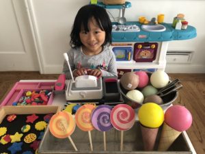 A pretend cookie shop can be set up with homemade clay cookies, paper lollipops, and ice cream cones for hours of educational fun.