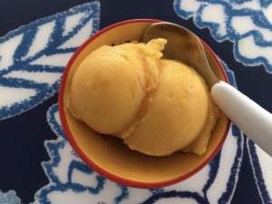 This fruit sorbet is made simply by freezing a can of fruit and processing it in a food processor until smooth.