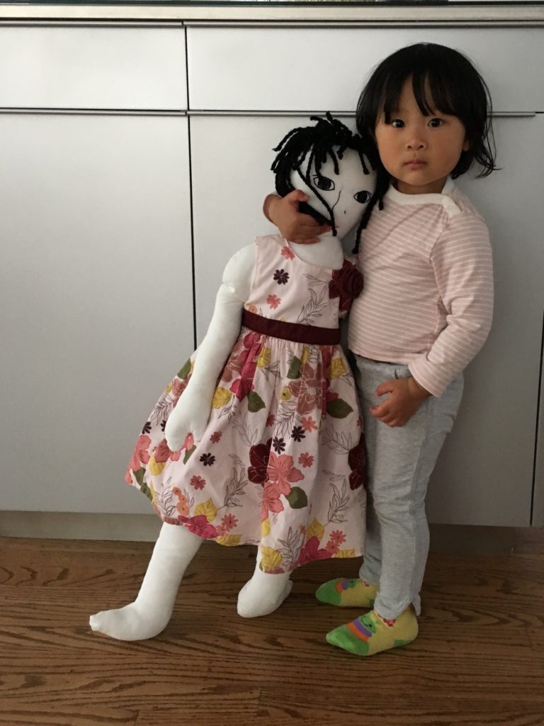 As she grows, Miss T is able to compare her height to Nancy, her life-size doll.