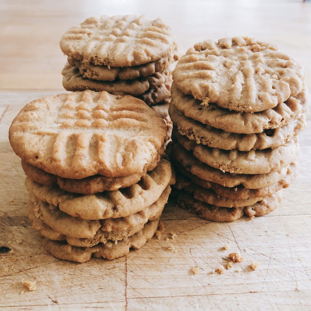 Peanut butter cookies, with their familiar cross-hatch patterns, are easy for kids to shape and bake.