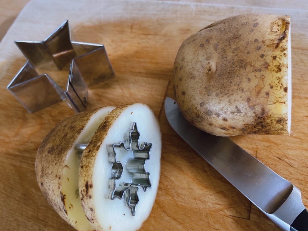 Slice off about 1/4-inch from cut side of potato. 