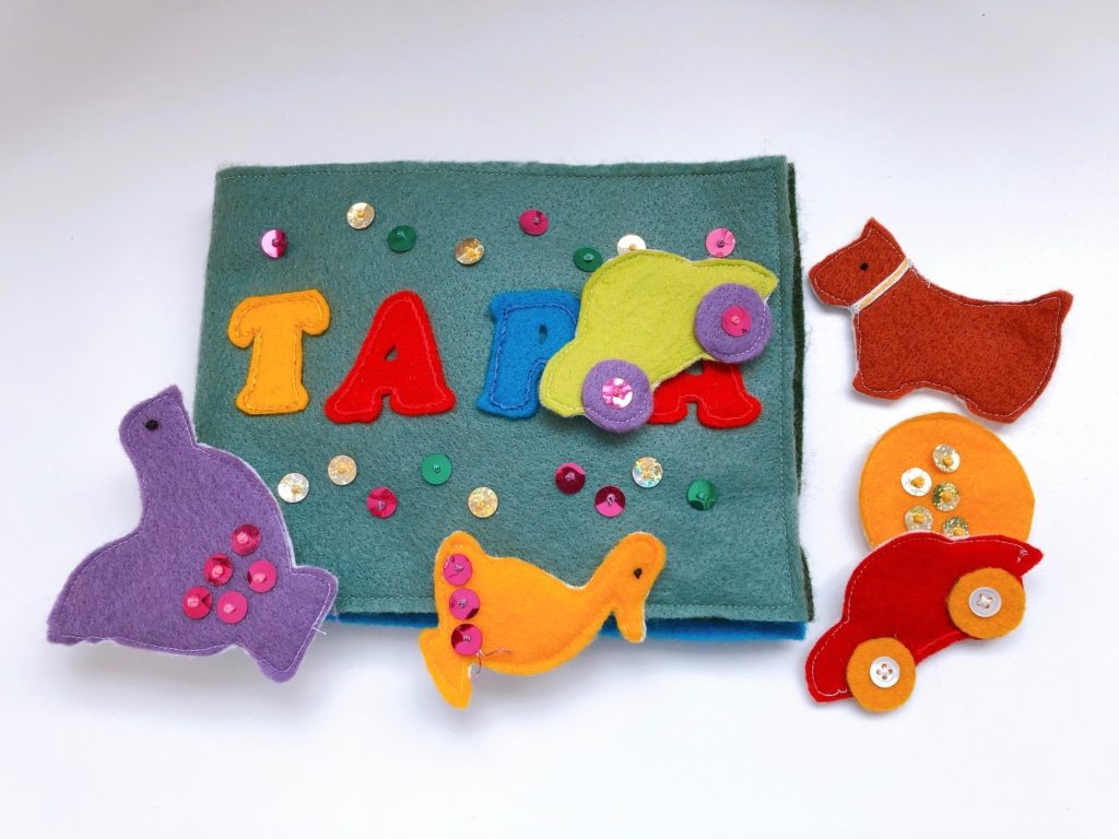 This home-sewn book is made with felt and features felt cutouts that adhere with Velcro.