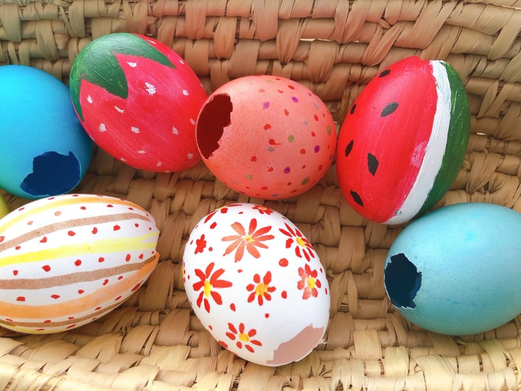 Eggs have been decorated and await confetti filling.