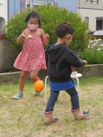 A race with small lemons on spoons is fun for siblings. This is one of the games to play for a summer celebration.