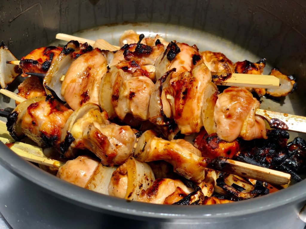 Yakitori, grilled chicken skewers, are easy to portion and serve for this family get-together.
