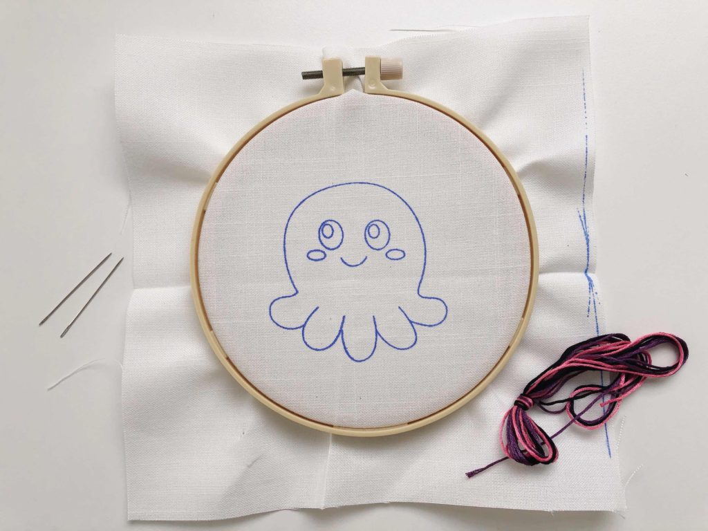 To learn to do embroidery, provide the child with a design imprinted on fabric, an embroidery hoop, needles and thread.