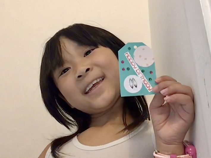 Here's Miss T's first attempt at making a gift tag from scraps.
