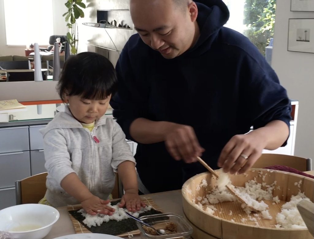 At three years old, Miss T learns how to make sushi at home. Daddy gives her guidance.