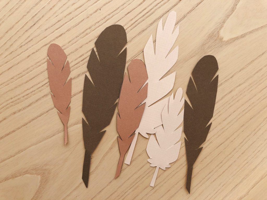 These feathers are cut out from an online template. They're awarded to people who can't think of something to be thankful for.