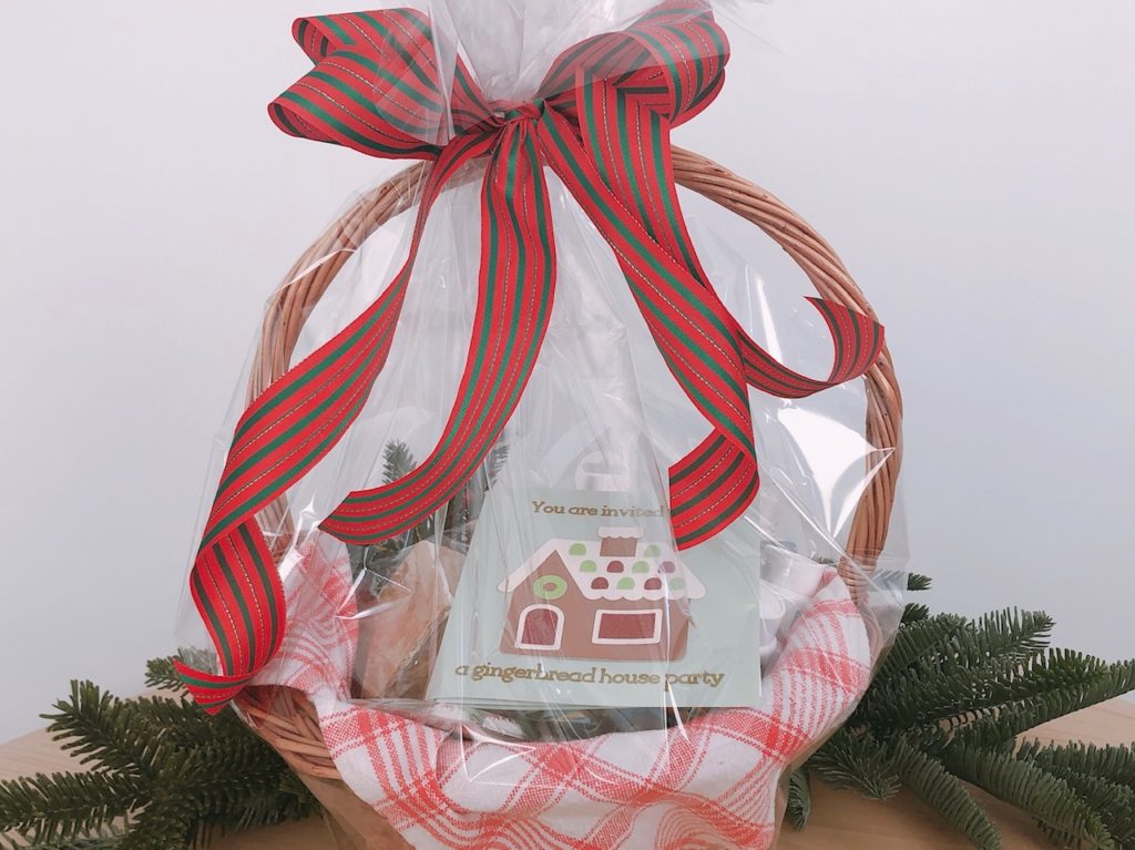 Also added to the basket are pre-made gingerbread houses and a party invitation for the online event.