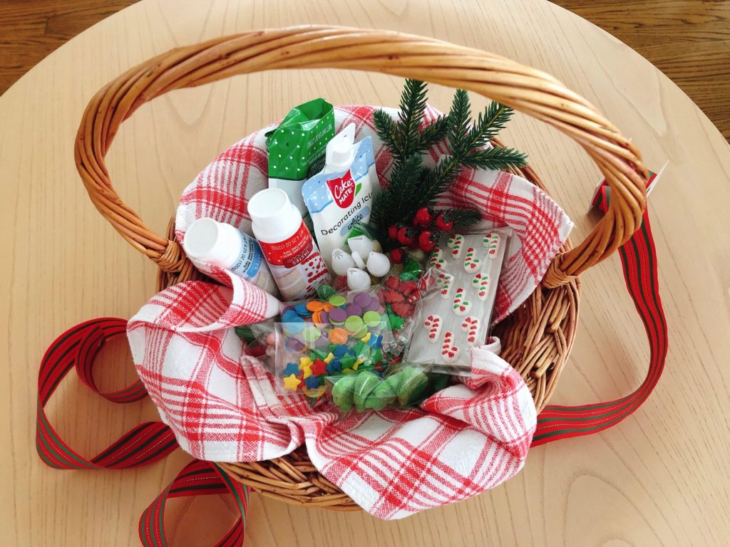 Partially filled basket to send to the grandkids: icing, icing tips, and candy to decorate their gingerbread house.