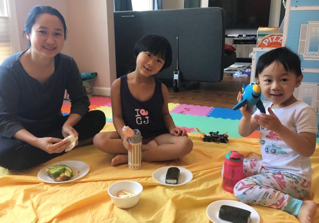 An indoor picnic is a simple and no-cost way to have fun with kids.