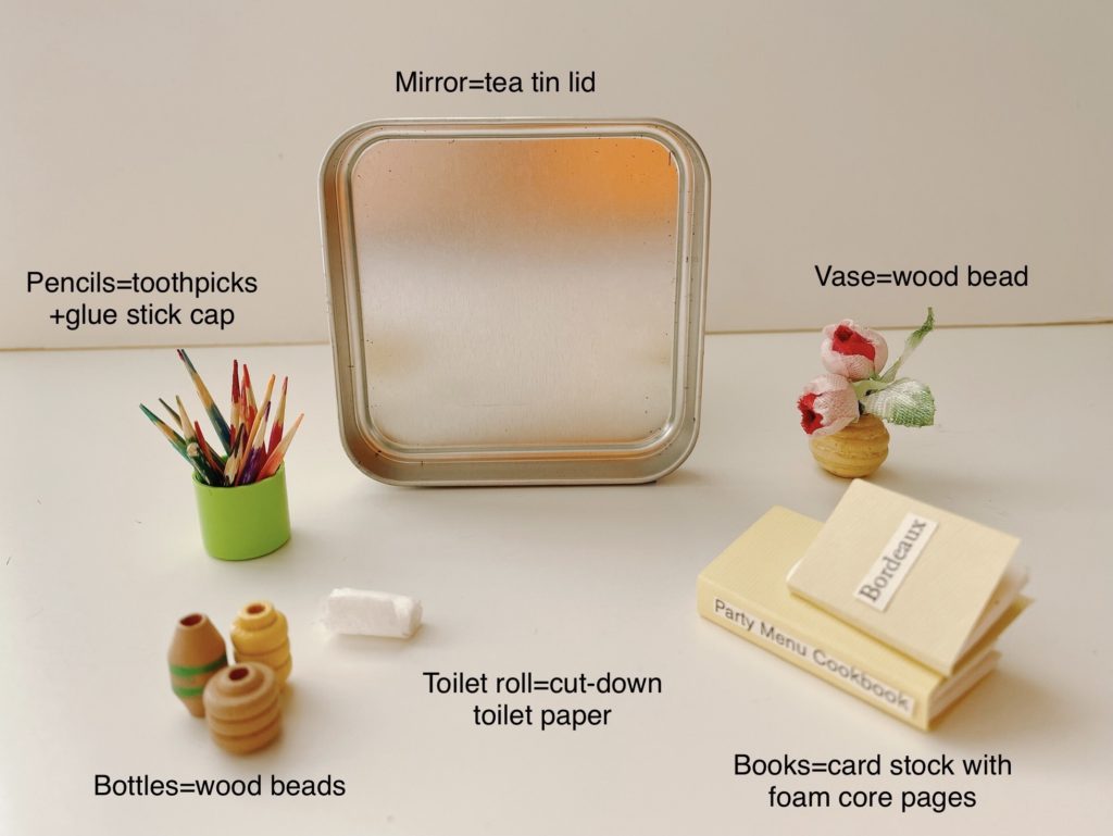 Turn bits of everyday items into accessories for a doll house, including toothpicks made into colored pencils.
