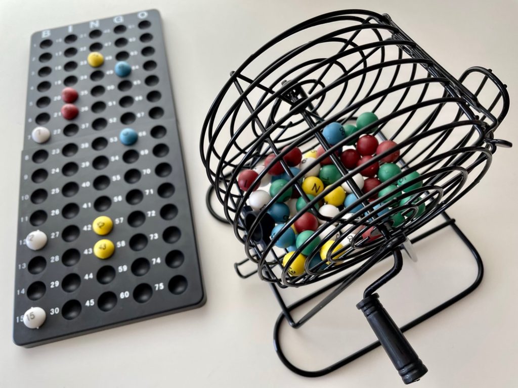 Bingo cage and counter on grandma's side of the socially distant bingo game.