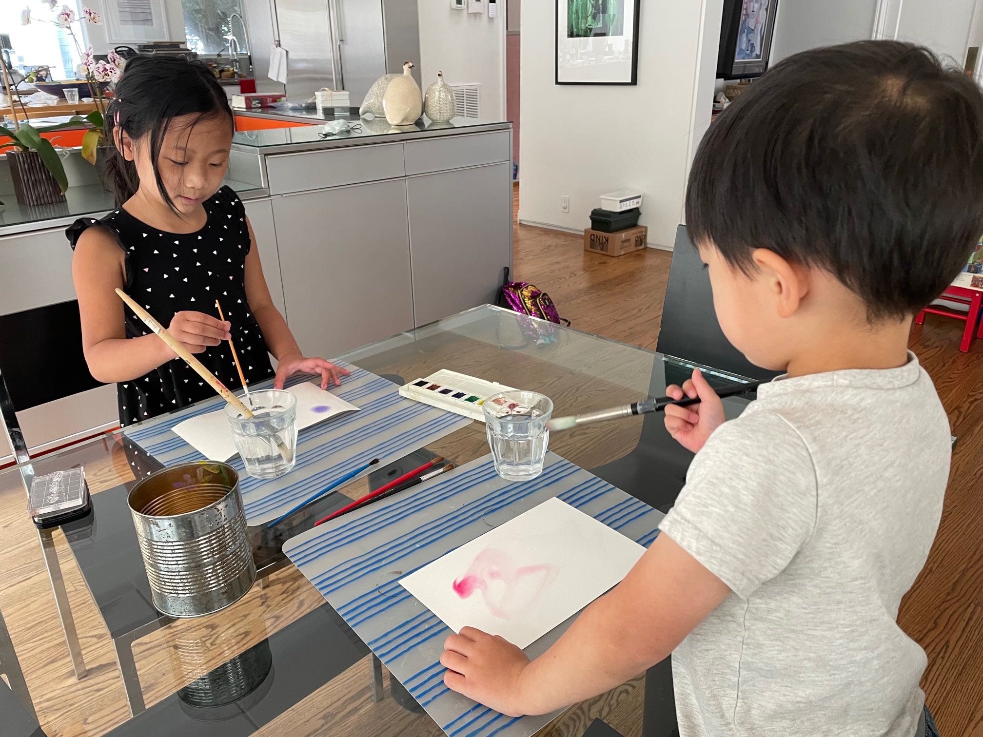 Kids painting Mother's Day cards.