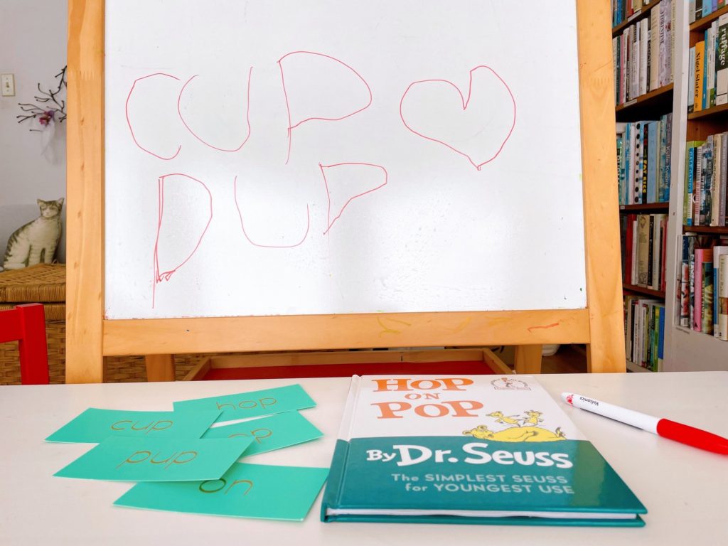 Read the book, review the words on flash cards, and write the words on a whiteboard.  All are ways to help a child learn to read and prep for kindergarten.