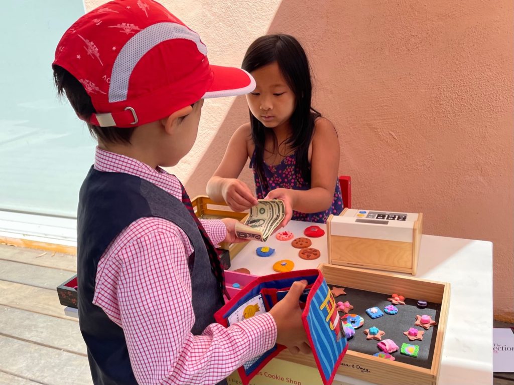 Take turns being the proprietor of the cookie shop to give everyone a chance, and to learn selling techniques from each other.