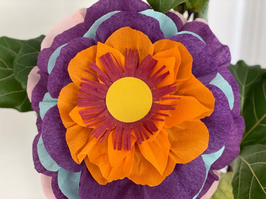 Our finished piñata features layers of crepe paper petals to create a colorful flower.