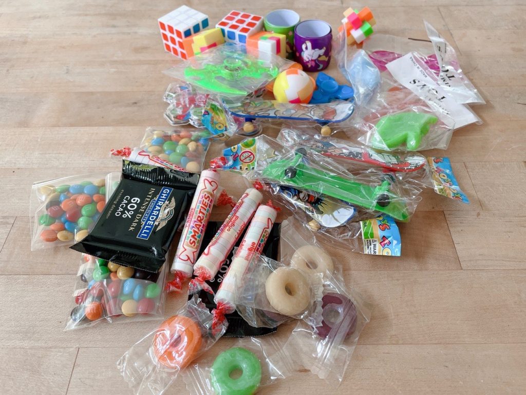 Once you make a piñata, you'll need to find little toys to fill it. You can buy a variety pack of cheap toys. Candy has been added  to the stash in the smallest amounts. 
