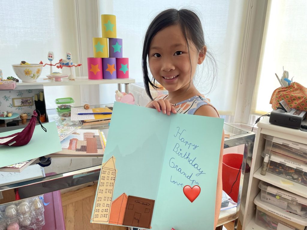 Make a greeting card with buildings made from torn paper. This is a birthday card for grandpa.