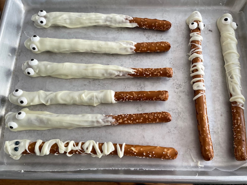 For the simplest Halloween treat, dip or drizzle white chocolate on pretzel rods to make ghosts or mummies.