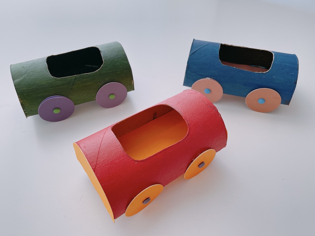 Cars made with toilet paper rolls and cardstock are toilet paper roll crafts kids can have fun with.