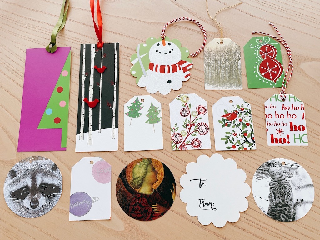 Recycle old Christmas cards to make gift tags. Use paper punches of different sizes and 
"to and from" stamps.