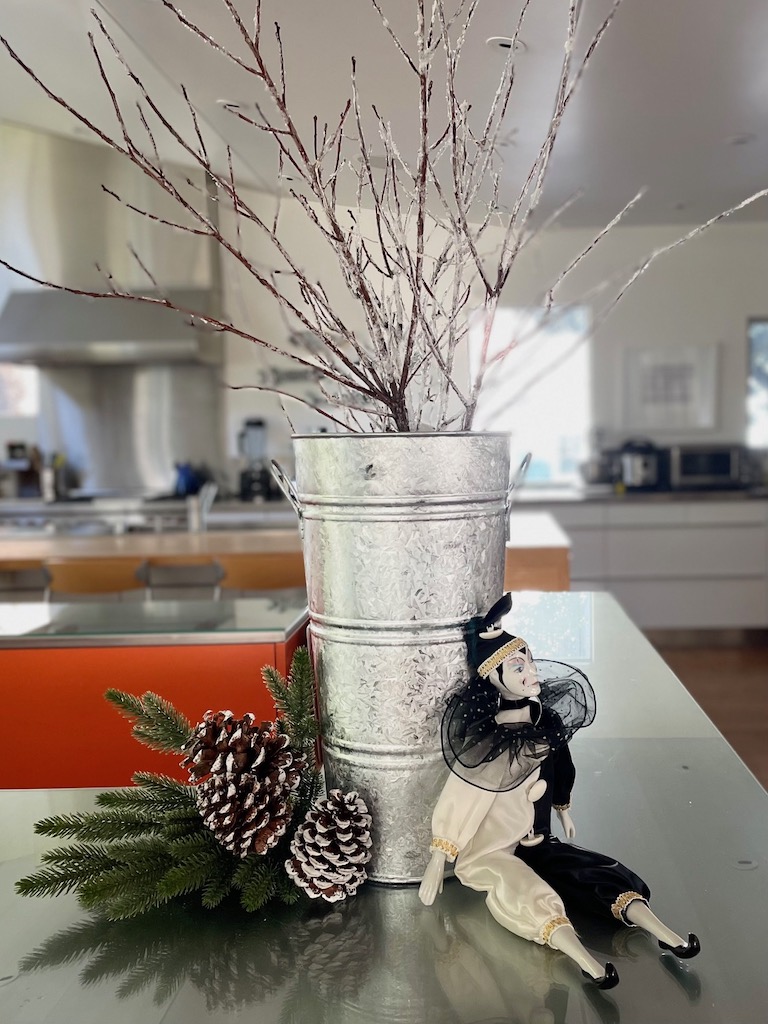 Cover dried branches with white school glue and epsom salt for a wintery holiday arrangement.