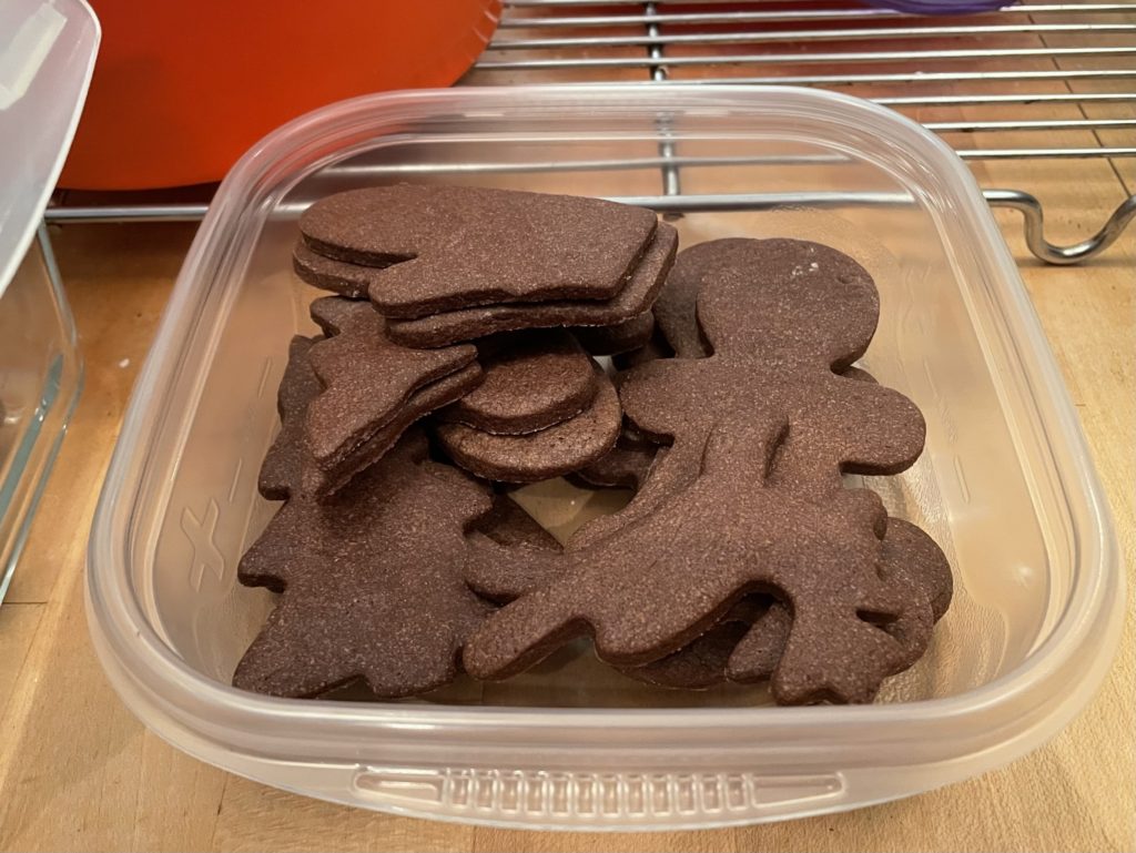 Chocolate Cutout Cookies resemble gingerbread in color, but are more palatable for kids. They're packed in a plastic container, ready for decorating.