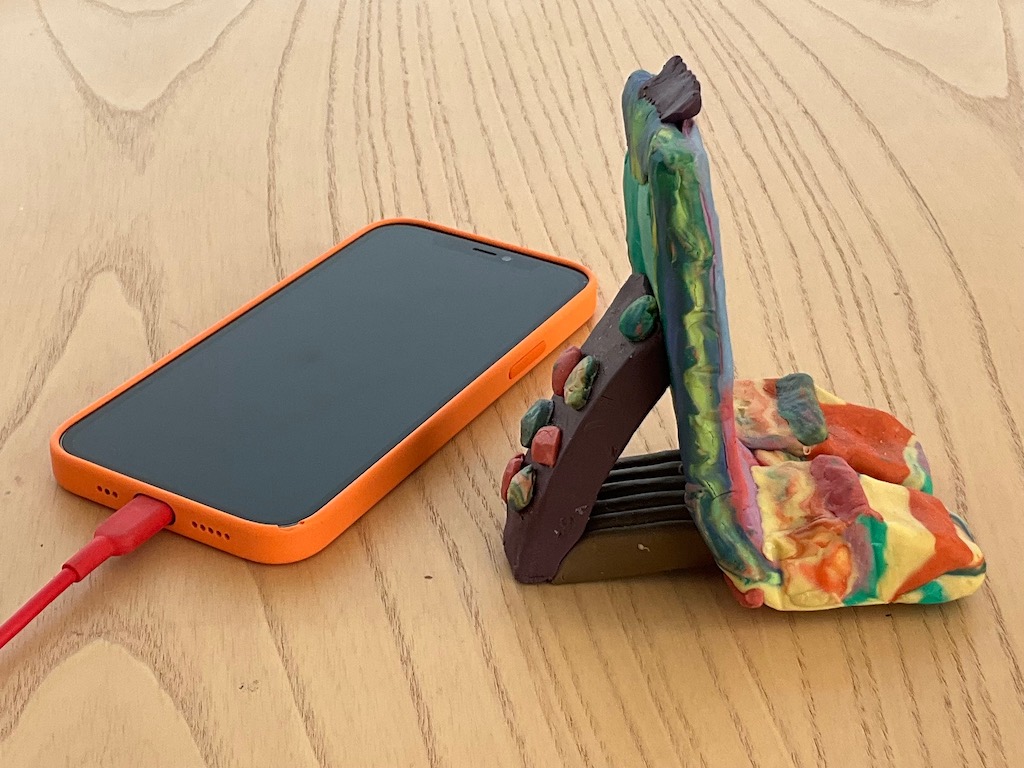 Providing tools and materials to children help to inspire imagination. This phone stand, made with polymer clay, was done by an eight-year-old.
