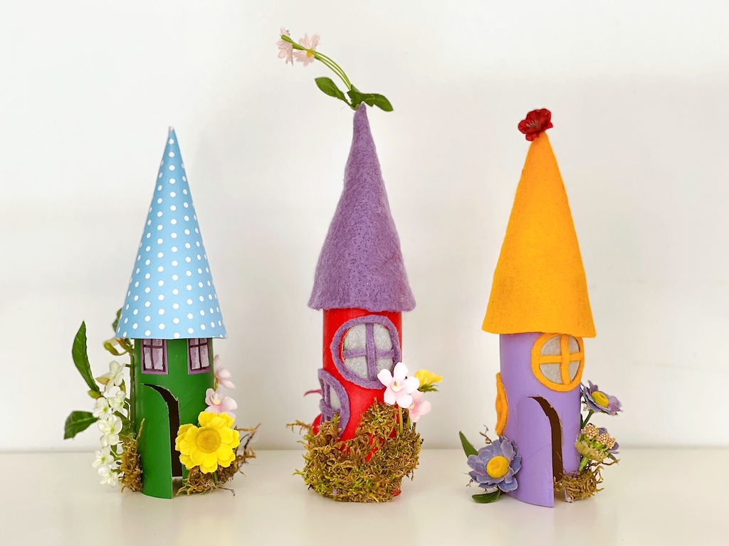 Toilet paper roll crafts: elf houses made with paper or felt, and decorated with artificial flowers and dried moss.