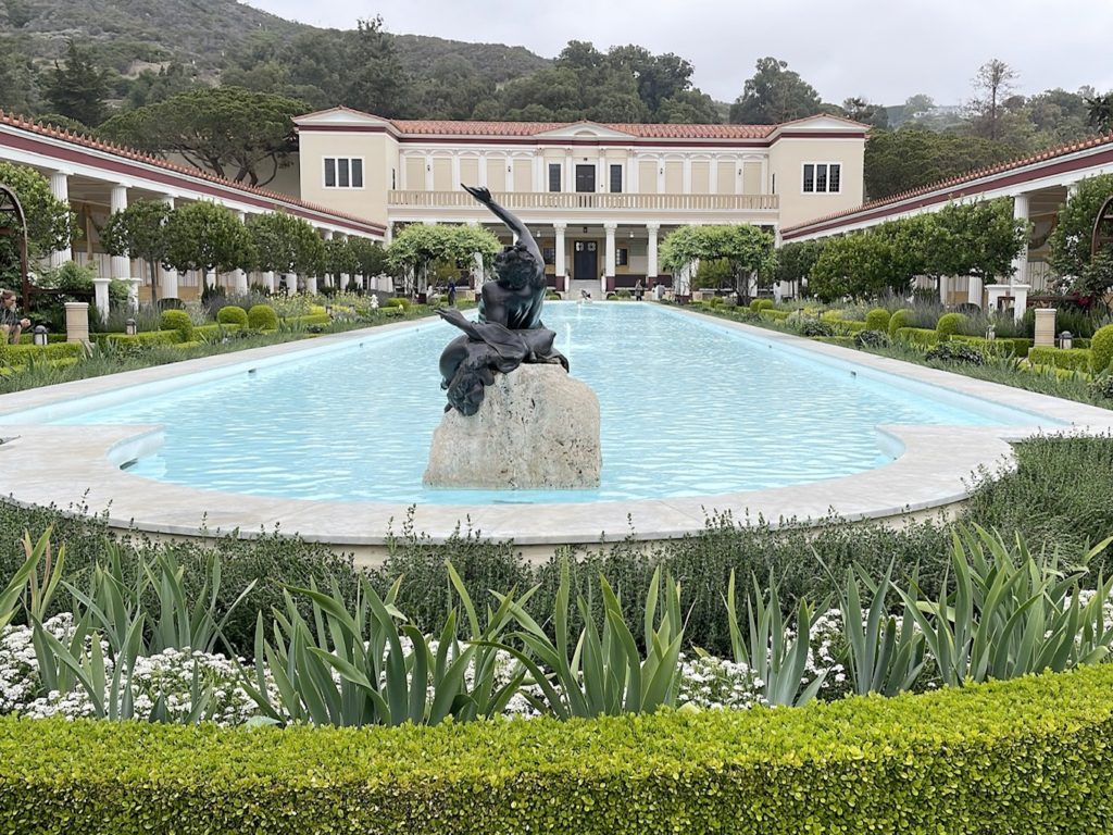 Reflecting pool at Getty Villa, an art museum of antiquities. Spending time outdoors is safer for Covid-cautious vacations.