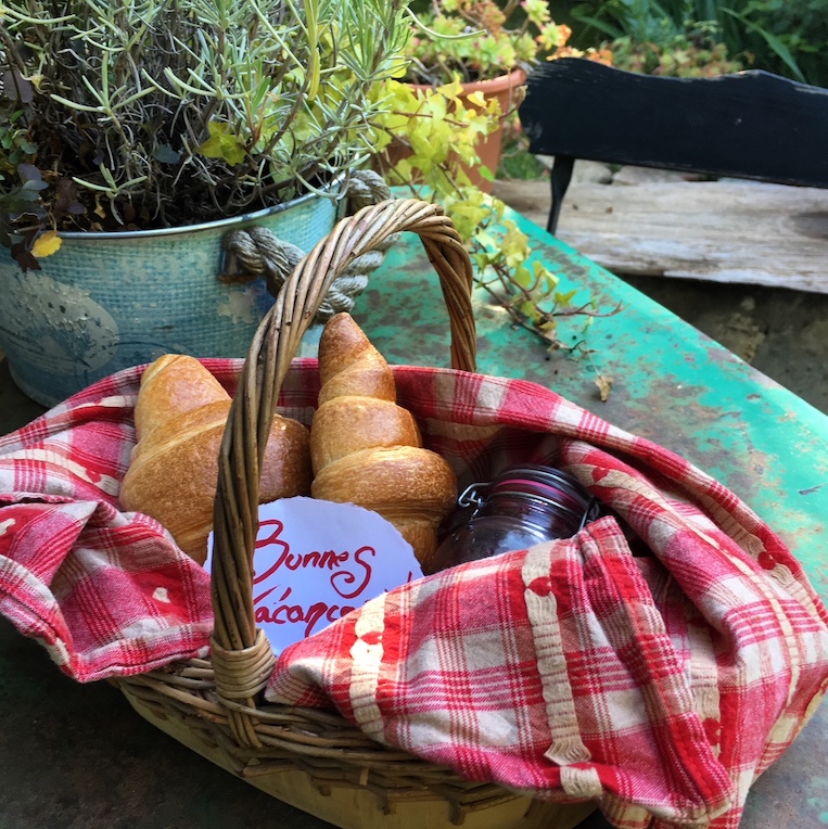 Start your armchair traveling day with a basket of croissants and jam to feel like you're in France.