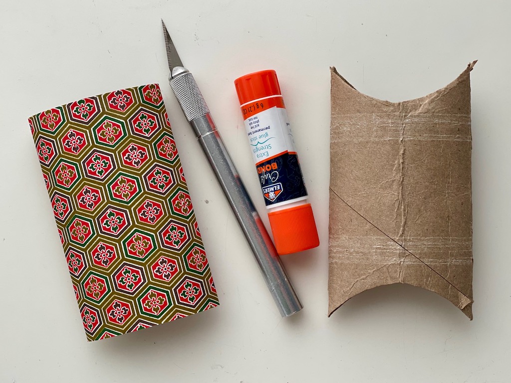 Mother's Day project includes crafting a box from a toilet paper roll to hold a Mother's Day video.