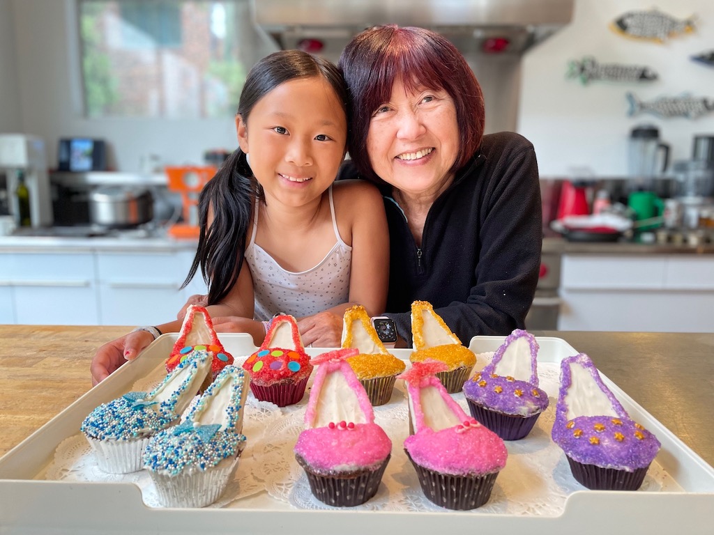 The bakers enjoy the success when the high. heel cupcakes are complete.