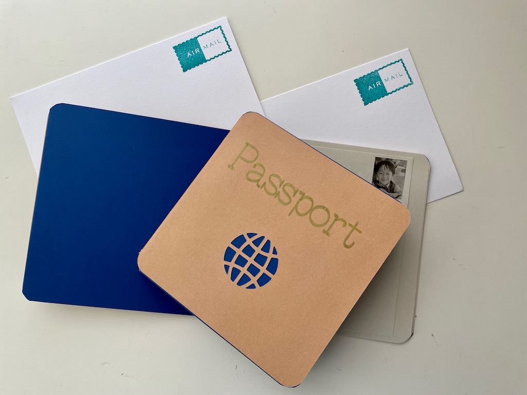 Make a passport, add the child's photo, and provide blank cardstock for drawing postcards.