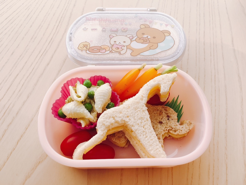 Use cookie cutters to cut ordinary cheese sandwiches in fun shapes to make the best bento. This bento features an elephant and giraffe.
