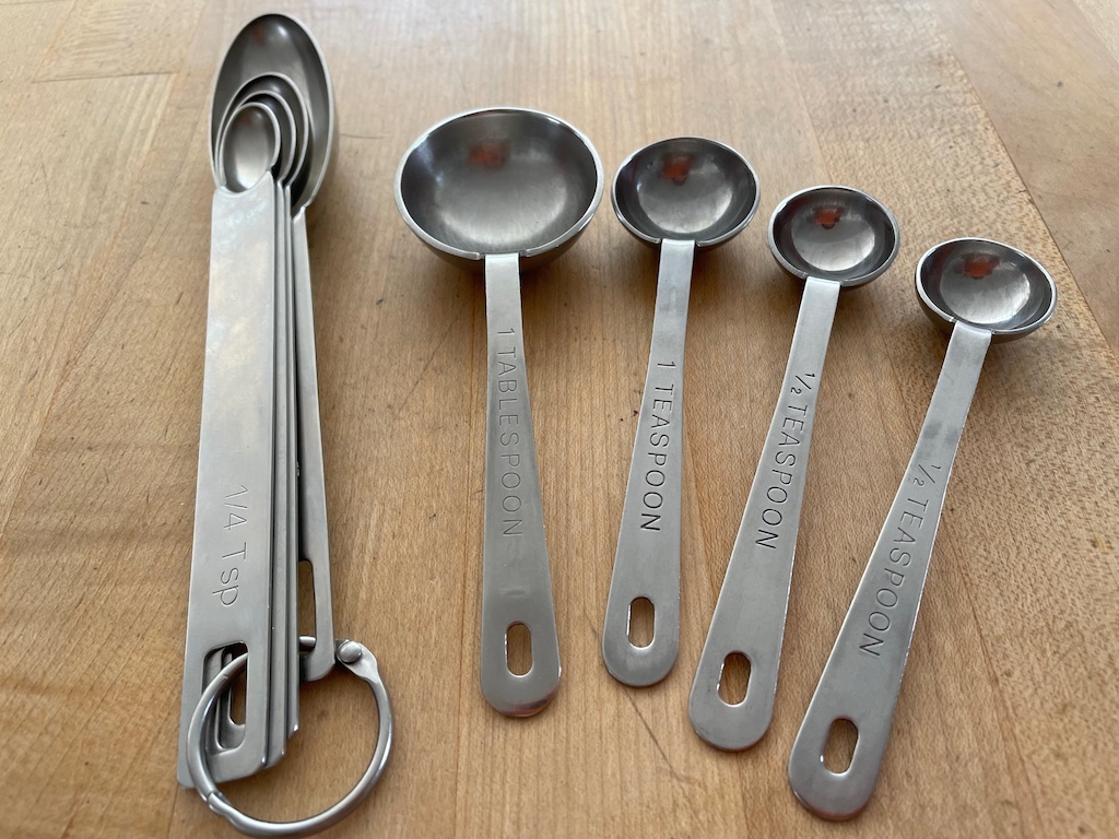 Remove the ring from a measuring spoon set so you use only the spoons you need for a recipe.