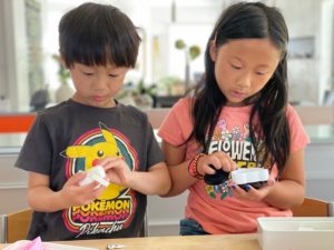 Kids making their own bento.