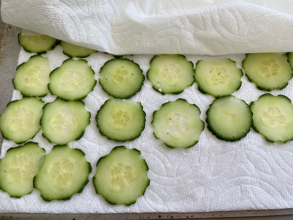 To keep cucumber sandwiches from getting soggy, lay the slices between paper towels to absorb moisture.