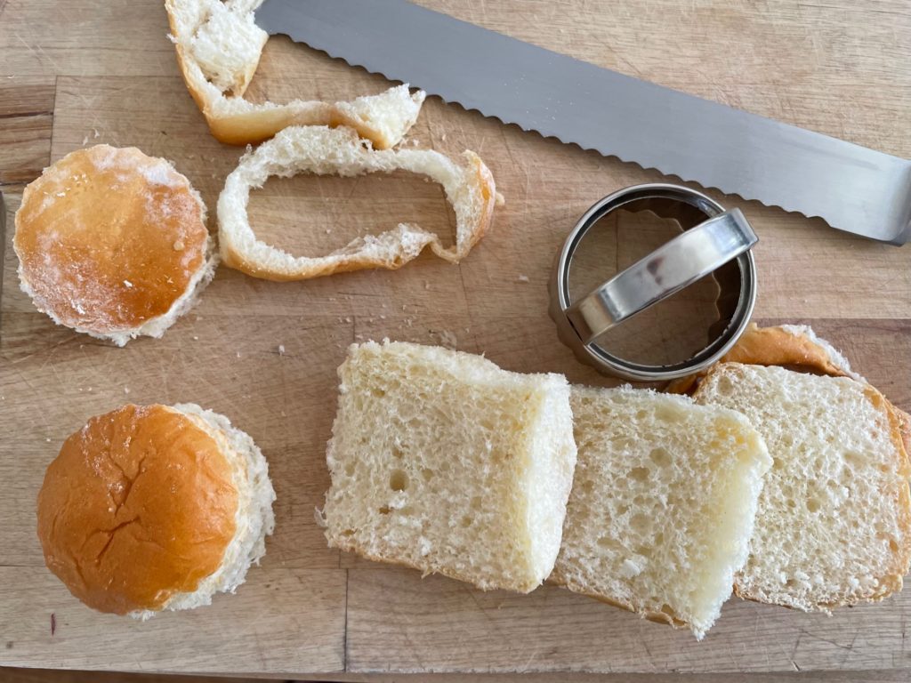 Slit a King's Hawaiian Sweet Roll in thirds, lengthwise. Cut each slice with a biscuit cutter and use two slices for each sandwich.