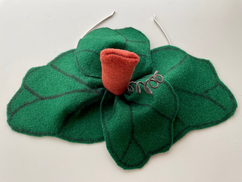 The finished leaf headdress with pumpkin vine and stem.