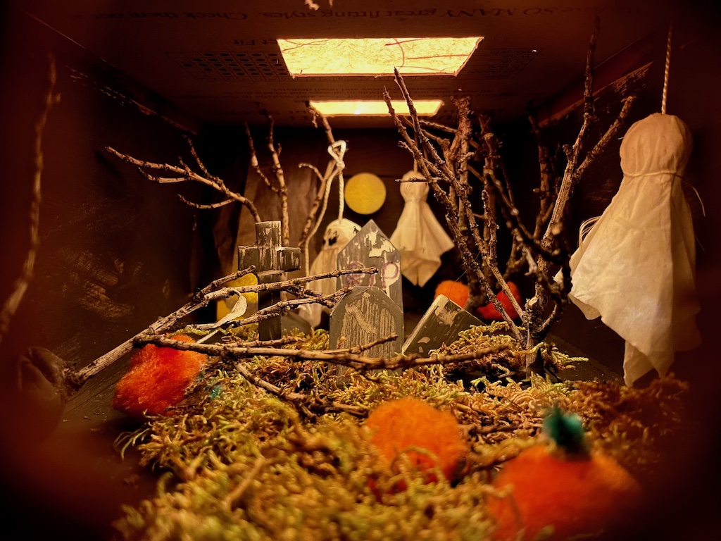 Looking from the peephole at the final Halloween diorama.