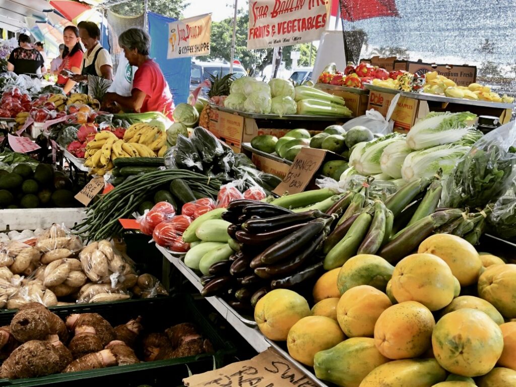 Hilo's farmers' market offers an abundant  variety of produce, prepared foods, flowers, and arts and crafts.