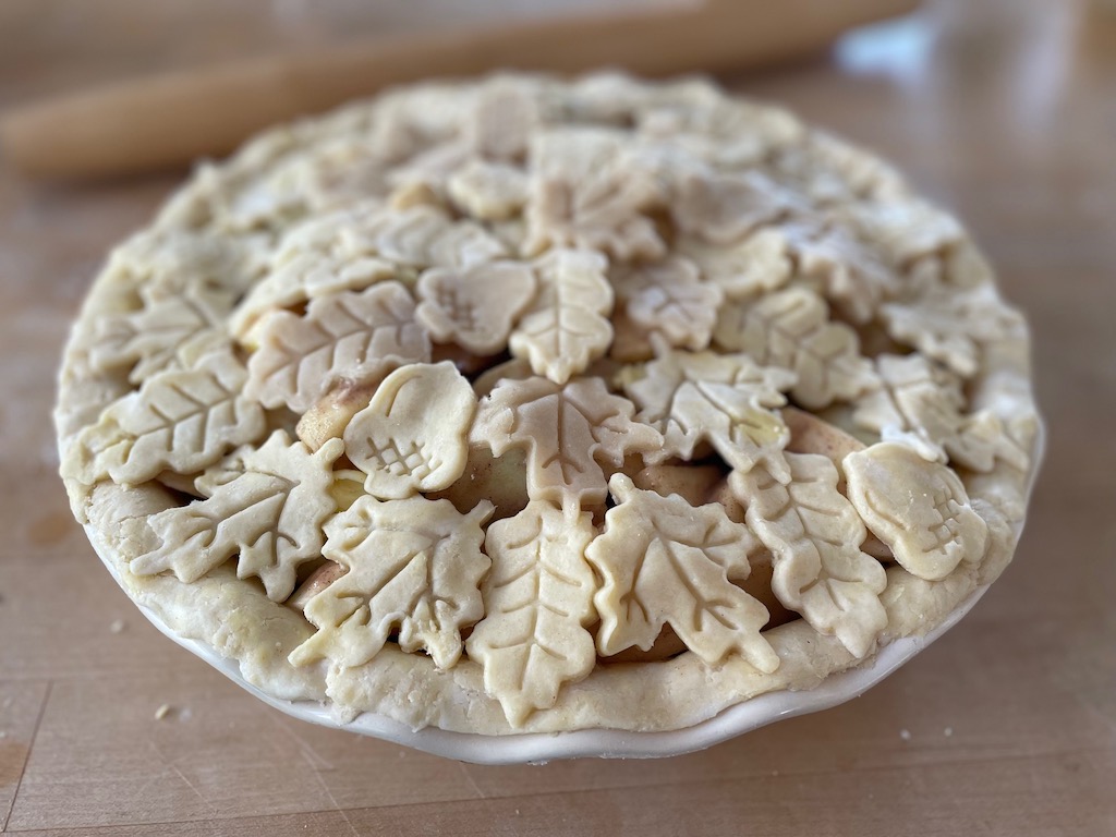 Apple pie with pie crust leaves.