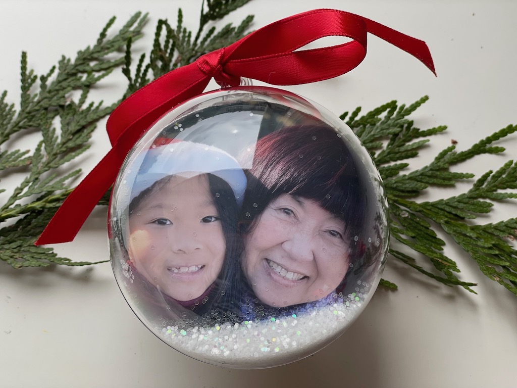 DIY Photo Christmas ornament features grandma and grandchild.