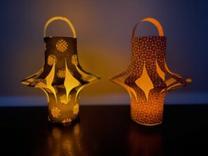 DIY Chinese paper lanterns are made with origami paper. Add a battery-powered tea light for an authentic glow.