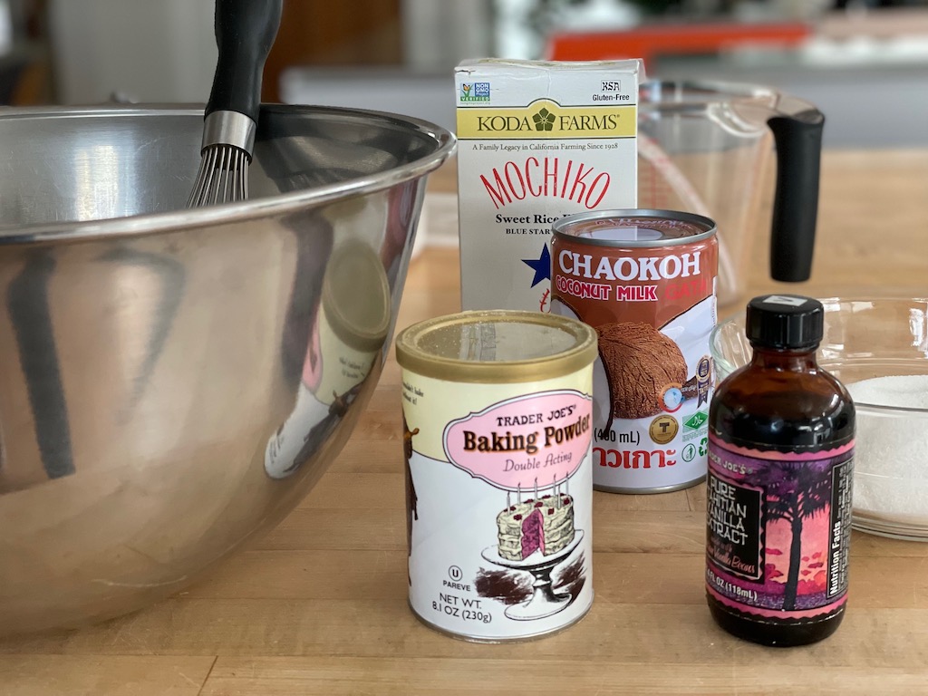 Ingredients for chichi dango: mochiko (sweet rice flour), coconut milk, baking powder, vanilla extract, and sugar. Not shown: potato starch.