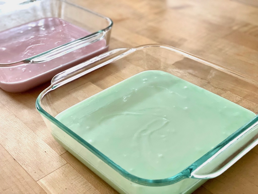 Two colors of chichi dango batter ready for baking.
