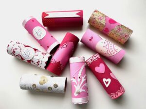 Toilet paper rolls decorated and turned into valentines.